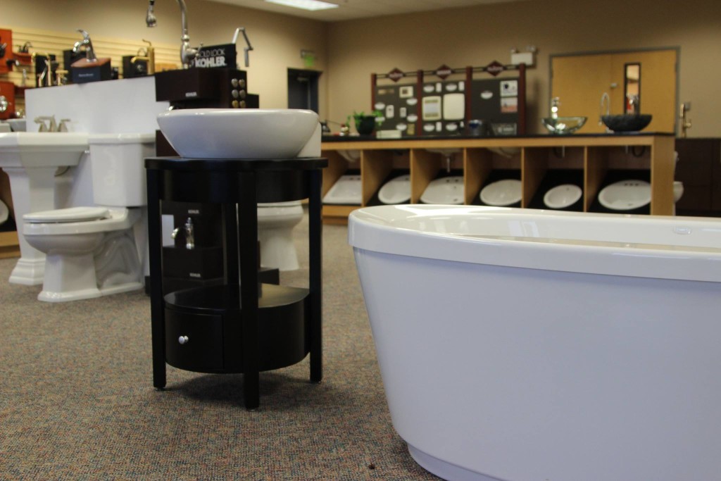 Bathtub, Sinks, Faucets, and Toilets on display at Van's Plumbing & Electric sink, faucets, bathtub, bath, showroom, Kohler, delta, moen, kitchen, bathroom